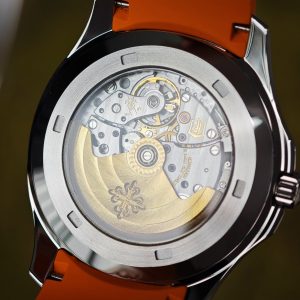 The Aquanaut 5167A is customized with the best imported replacement boards, pointers, and calendars. The case details are polished twice and a natural orange rubber strap is used. PPM324 integrated movement - Image 12