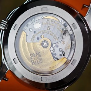 The Aquanaut 5167A is customized with the best imported replacement boards, pointers, and calendars. The case details are polished twice and a natural orange rubber strap is used. PPM324 integrated movement - Image 13