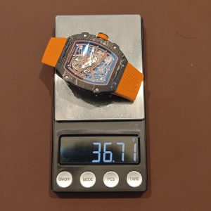 Richard Mille 67-02 Orange Storm, bespoke CRMA7 movement, carbon fiber case, orange nylon strap, paired with a Velcro strap - Image 14