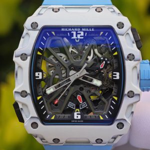The Richard Mille RM35-03, in white, is equipped with a customized Parmigiani movement. All functions are authentic and operational. It features a deployable butterfly rotor, a customized imported carbon fiber case, and a blue natural rubber strap. - Image 8