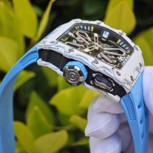 The Richard Mille RM35-03, in white, is equipped with a customized Parmigiani movement. All functions are authentic and operational. It features a deployable butterfly rotor, a customized imported carbon fiber case, and a blue natural rubber strap. - Image 16
