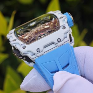 The Richard Mille RM35-03, in white, is equipped with a customized Parmigiani movement. All functions are authentic and operational. It features a deployable butterfly rotor, a customized imported carbon fiber case, and a blue natural rubber strap. - Image 19