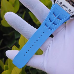 The Richard Mille RM35-03, in white, is equipped with a customized Parmigiani movement. All functions are authentic and operational. It features a deployable butterfly rotor, a customized imported carbon fiber case, and a blue natural rubber strap. - Image 20