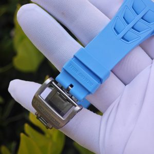 The Richard Mille RM35-03, in white, is equipped with a customized Parmigiani movement. All functions are authentic and operational. It features a deployable butterfly rotor, a customized imported carbon fiber case, and a blue natural rubber strap. - Image 21