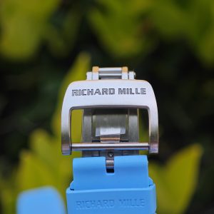 The Richard Mille RM35-03, in white, is equipped with a customized Parmigiani movement. All functions are authentic and operational. It features a deployable butterfly rotor, a customized imported carbon fiber case, and a blue natural rubber strap. - Image 22