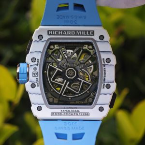 The Richard Mille RM35-03, in white, is equipped with a customized Parmigiani movement. All functions are authentic and operational. It features a deployable butterfly rotor, a customized imported carbon fiber case, and a blue natural rubber strap. - Image 24