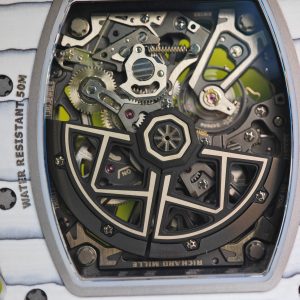 The Richard Mille RM35-03, in white, is equipped with a customized Parmigiani movement. All functions are authentic and operational. It features a deployable butterfly rotor, a customized imported carbon fiber case, and a blue natural rubber strap. - Image 31